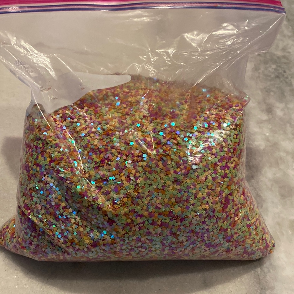 Star glitter. This is 3/4th of a gallon sized zip lock bag of glitter.